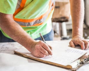 home inspector with clipboard