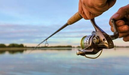 Fishing rod and reel on Lake Lewisville from the shore in The Colony