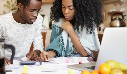 First time homebuyer couple trying to figure their budget for buying their first home