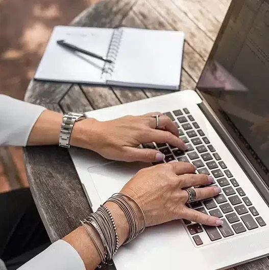 Lady working on a laptop